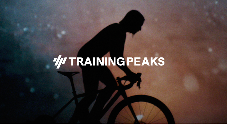 Photo of a bicyclist silhouette with the TrainingPeaks logo overalyed